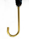 Luxury slim umbrella with bright roundel print, elegant black frame and striking gold handle by David David, a fashion accessories brand and print studio based in London England, specialising in bold geometric print
