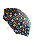 Luxury slim umbrella with bright roundel print, elegant black frame and striking gold handle by David David, a fashion accessories brand and print studio based in London England, specialising in bold geometric print