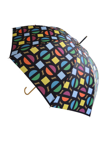 Luxury slim umbrella with bright roundel print, elegant black frame and striking gold handle by David David, a fashion accessories brand and print studio based in London England, specialising in bold geometric print