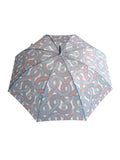 Luxury slim umbrella with pastel chain canopy design, elegant black frame and striking gold handle by David David, a fashion accessories brand and print studio based in London England, specialising in bold geometric print