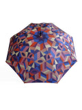 Luxury slim umbrella with stunning monochrome canopy design, elegant black frame and striking gold handle by David David, a fashion accessories brand and print studio based in London England, specialising in bold geometric print