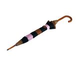 Luxury double canopy umbrella with maple wood handle and shaft by David David, a fashion accessories brand and print studio based in London England, specialising in bold geometric print