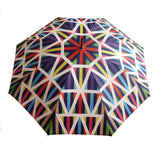 Luxury double canopy umbrella with maple wood handle and shaft by David David, a fashion accessories brand and print studio based in London England, specialising in bold geometric print