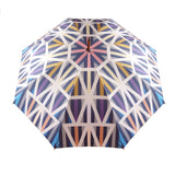 Luxury double canopy umbrella with maple wood handle and shaft by David David, a fashion accessories brand and print studio based in London England, specialising in bold geometric print