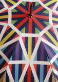 Luxury double canopy umbrella with maple wood handle and shaft by David David, a fashion accessories brand and print studio based in London England, specialising in bold geometric print