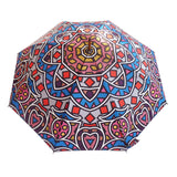 Luxury double canopy umbrella with maple wood handle and shaft by David David, a fashion accessories brand and print studio based in London England, specialising in bold geometric print