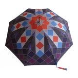 Luxury double canopy umbrella with maple wood handle and shaft by David David, a fashion accessories brand and print studio based in London England, specialising in bold geometric print